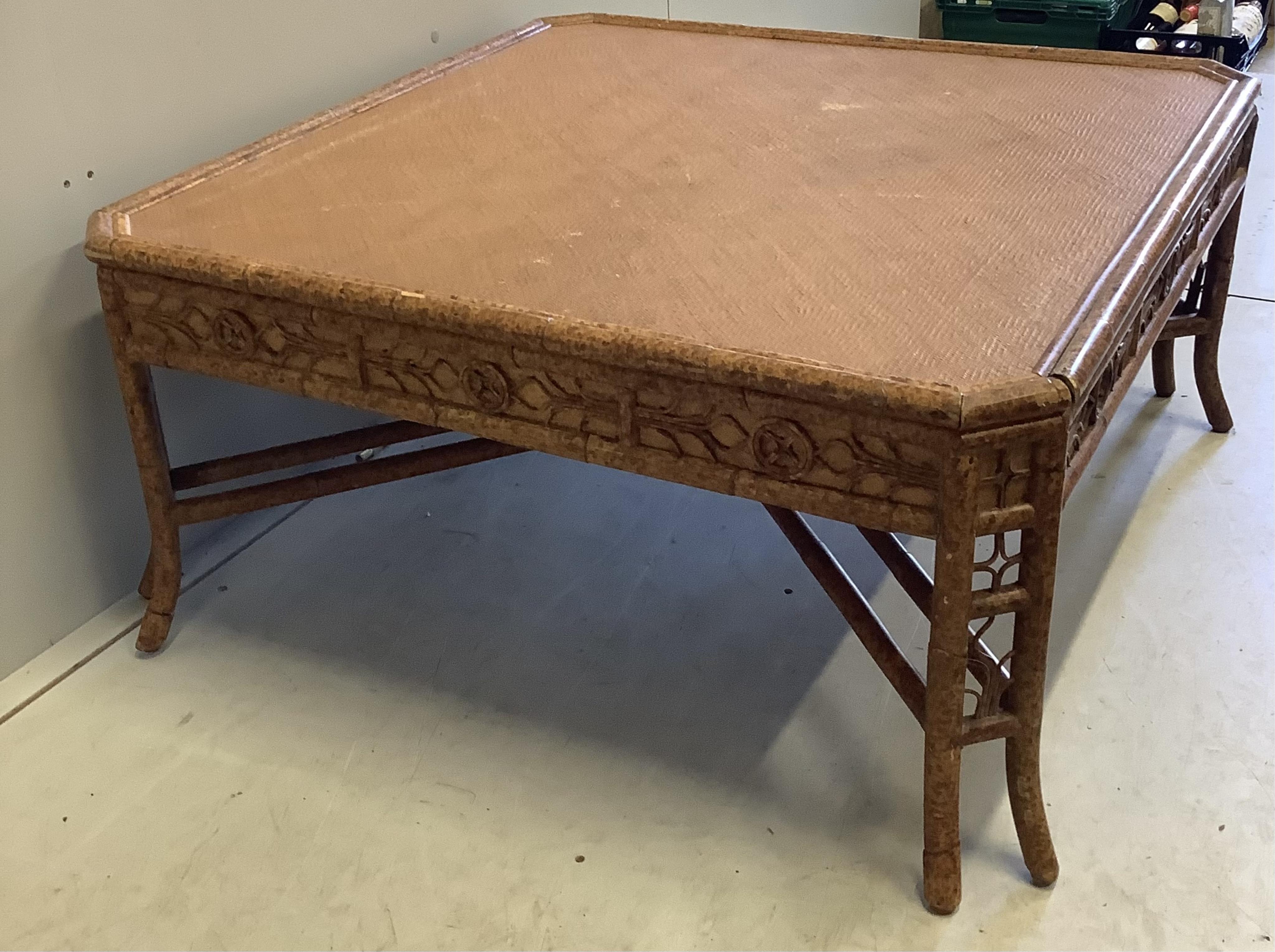 A square bamboo and rattan coffee table, width 94cm, height 44cm. Condition - fair